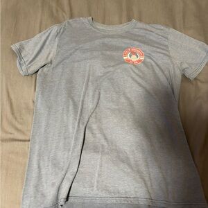 Light Gray Graphic Pocket-Style Tee with Small Crest